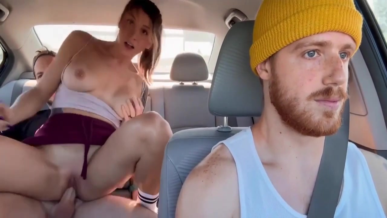Tattooed blonde sucks bearded cock in car